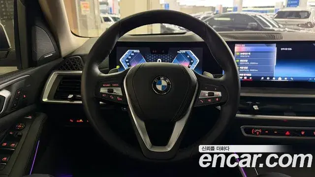 BMW X5 2024 — ფოტო 14/20