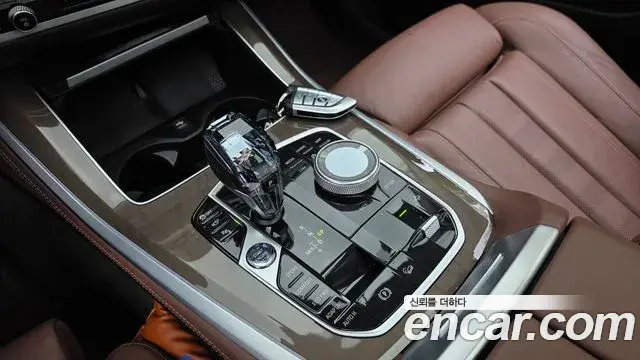 BMW X5 2022 — ფოტო 27/31