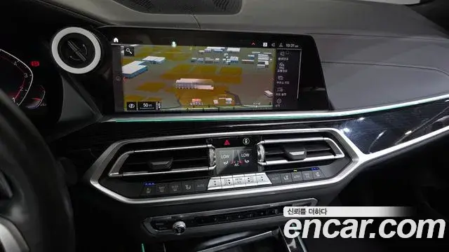 BMW X7 2019 — ფოტო 15/20