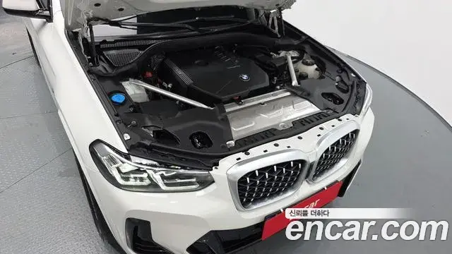 BMW X4 2023 — ფოტო 4/20