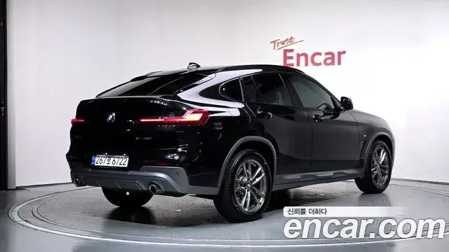BMW X4 2021 — Фото 2/20