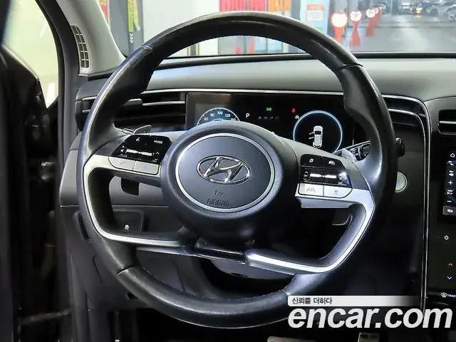 Hyundai Tucson Hybrid 2022 — ფოტო 16/20