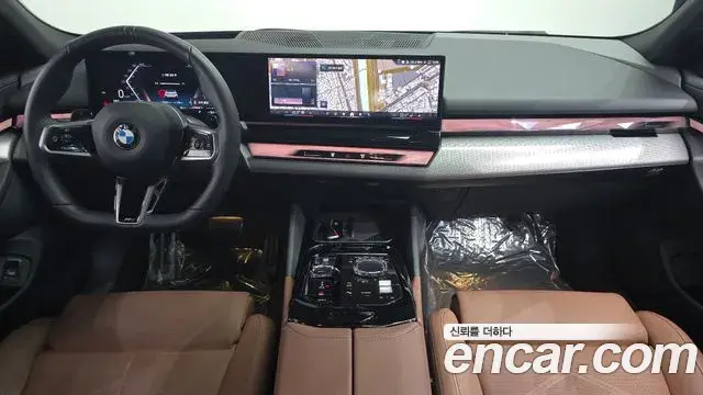 BMW 5 Series 2024 — ფოტო 22/33