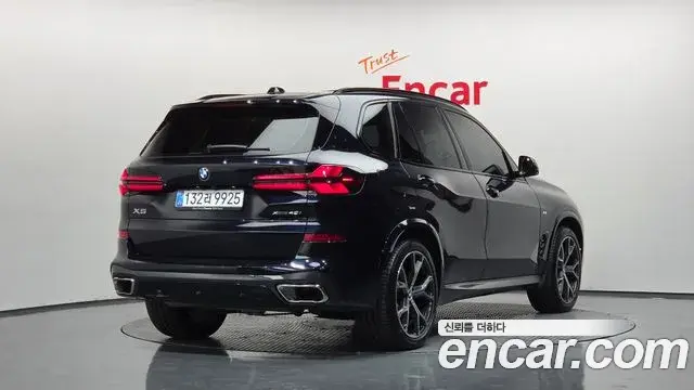 BMW X5 2025 — ფოტო 32/36