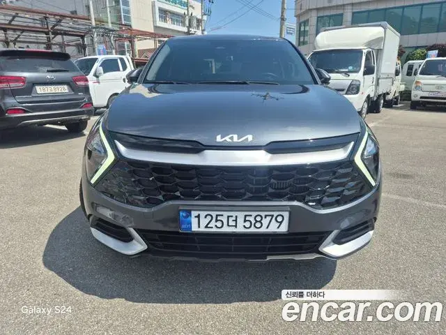 Kia Sportage 2024 — Фото 1/18