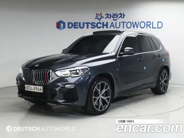 BMW X5 2020 — ფოტო 8/20