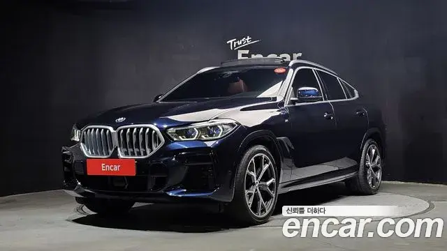 BMW X6 2021 — Фото 1/20