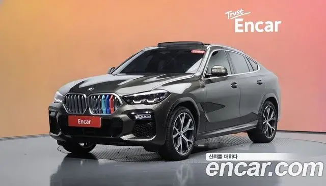 BMW X6 2021 — Фото 1/20