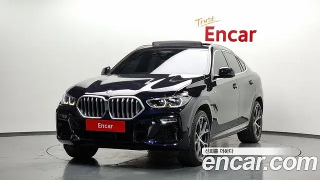 BMW X6 2021 — Фото 1/20