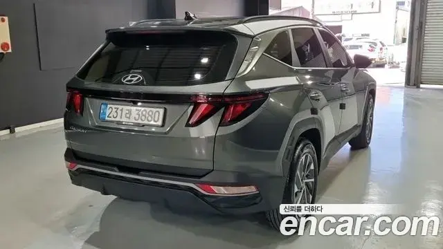 Hyundai Tucson Hybrid 2023 — ფოტო 2/16