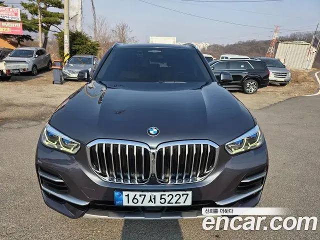 BMW X5 2022 — ფოტო 6/20