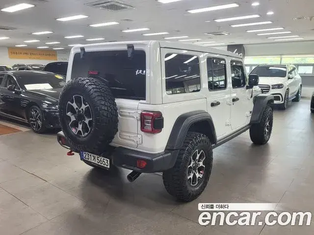 Jeep Wrangler 2023 — Фото 2/20