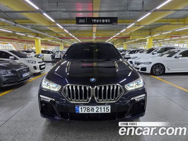 BMW X6 2021 — Фото 2/20