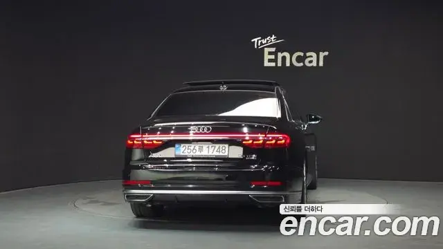 Audi A8 2021 — Фото 4/20