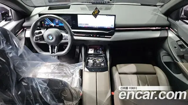 BMW 5 Series 2023 — ფოტო 7/20