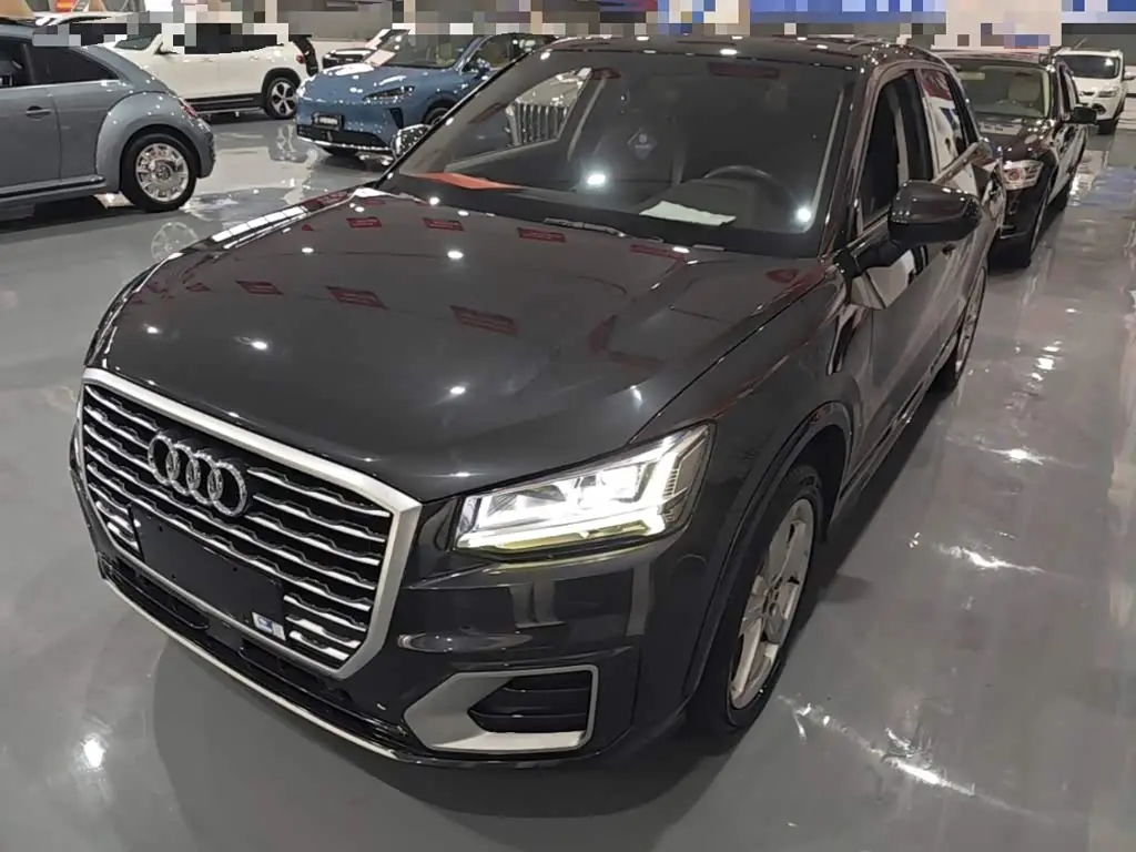 Audi Q2L 2021 — Photo 2/20