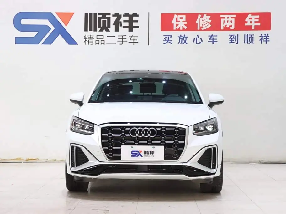 Audi Q2L 2022 — Photo 2/20