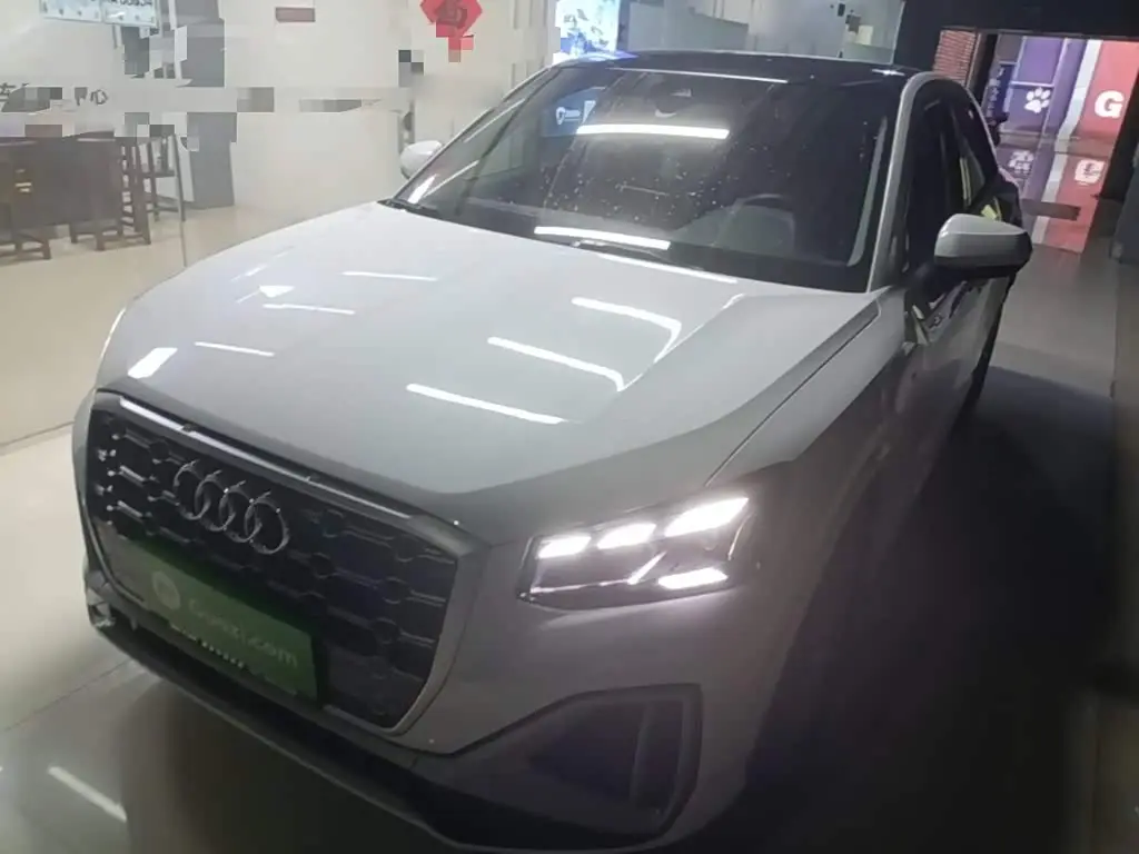 Audi Q2L 2023 — Фото 1/20