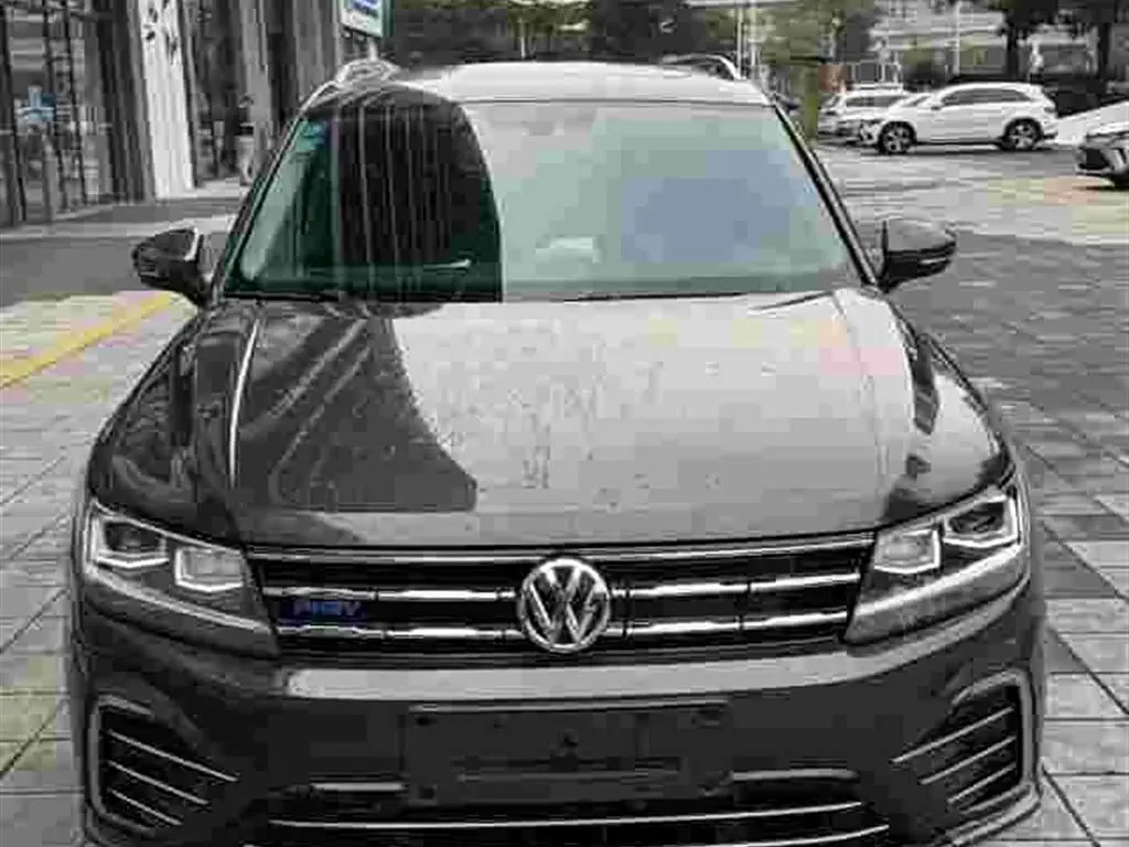 Volkswagen Tiguan L PHEV 2020 — Фото 1/8