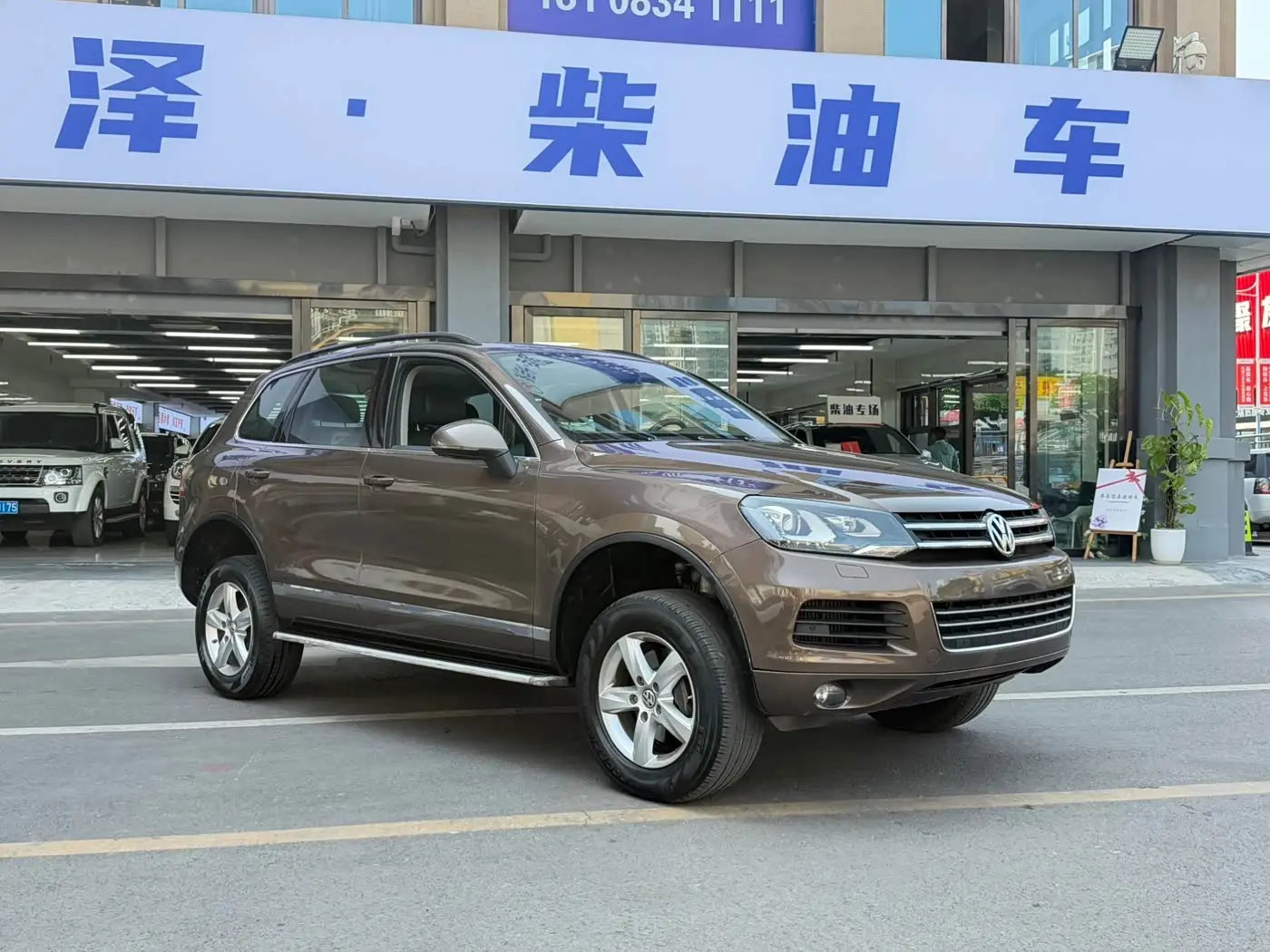Volkswagen Touareg 2013 — ფოტო 3/14