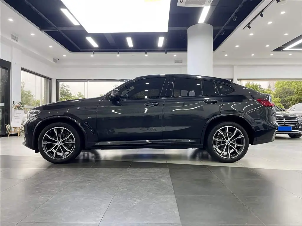BMW X4 2021 — ფოტო 7/20