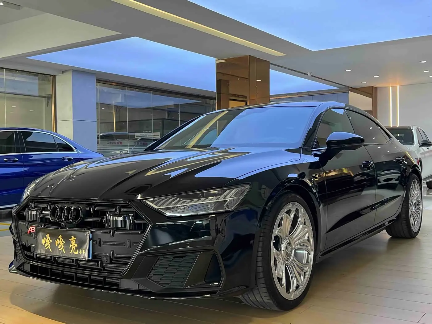 Audi A7L 2021 — Фото 1/11