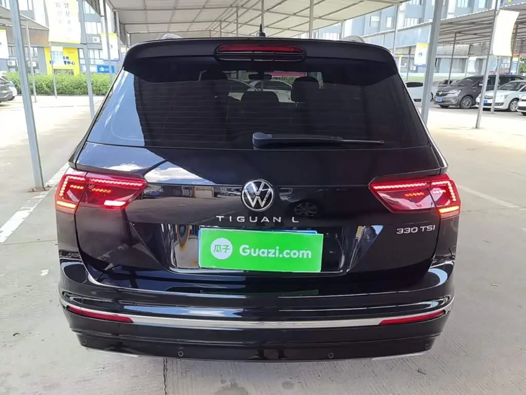Volkswagen Tiguan L 2021 — Photo 6/20