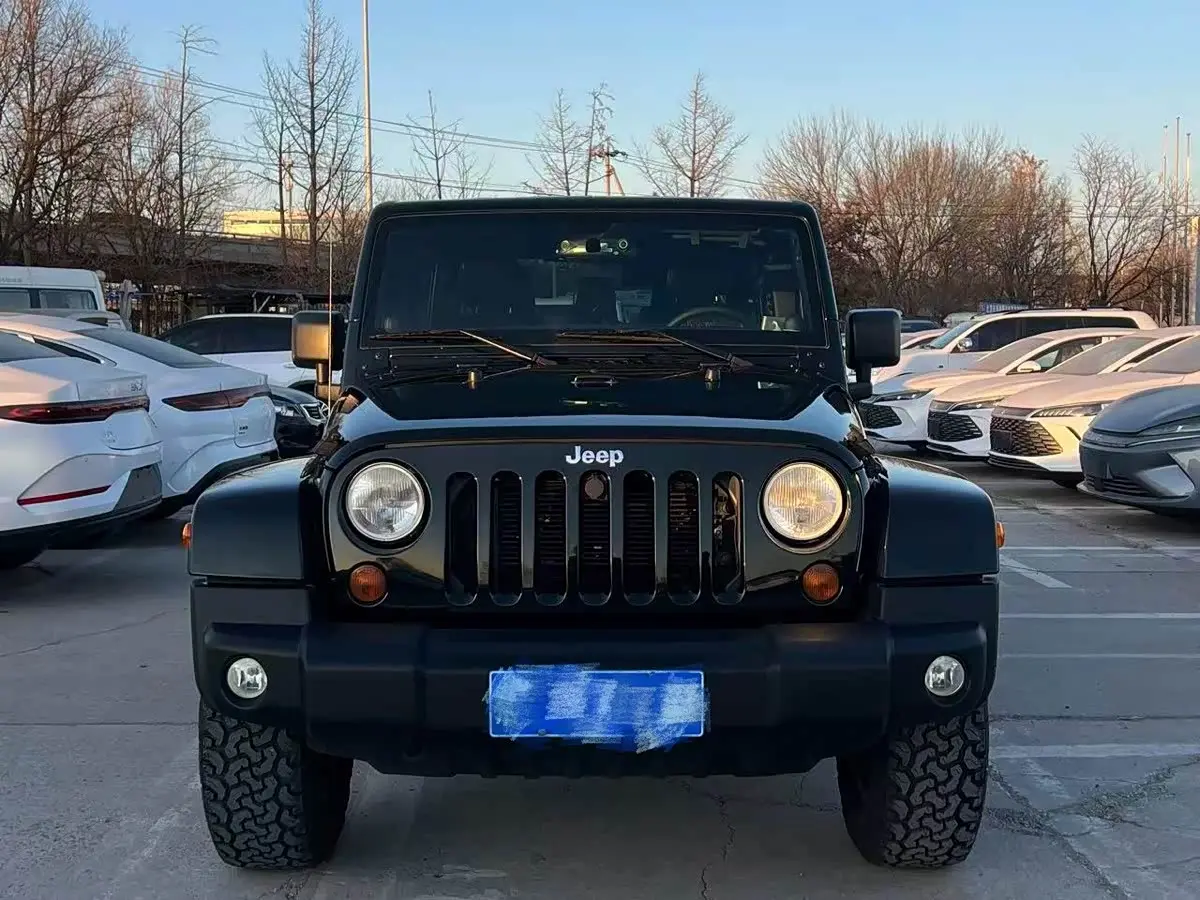 Jeep Wrangler 2012 — Фото 3/14