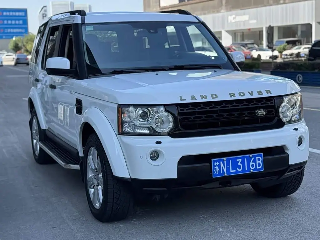 Land Rover Discovery 2013 — Фото 3/18