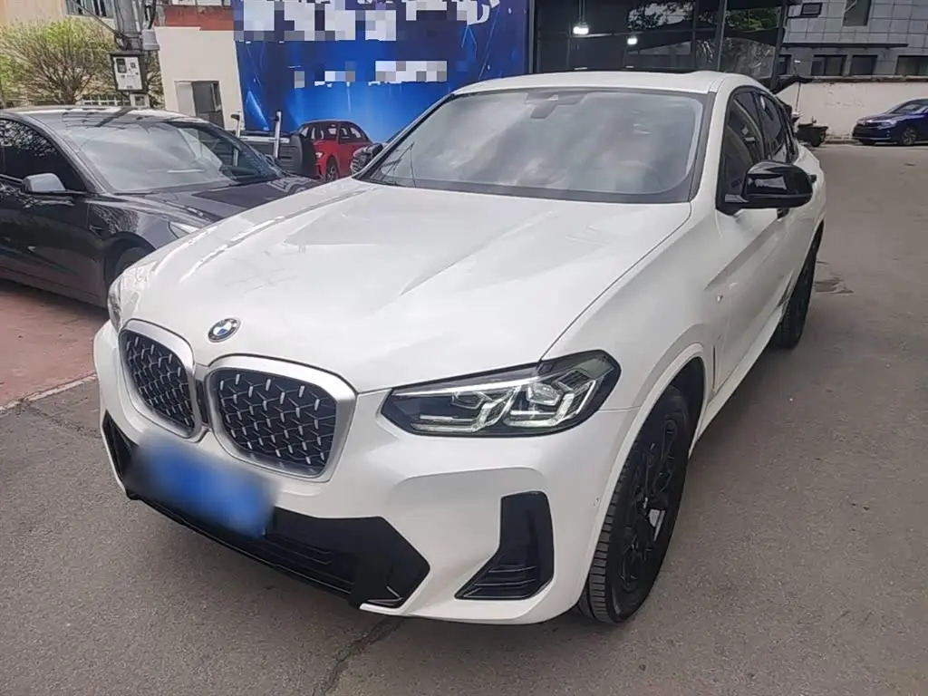 BMW X4 2024 — Фото 1/20