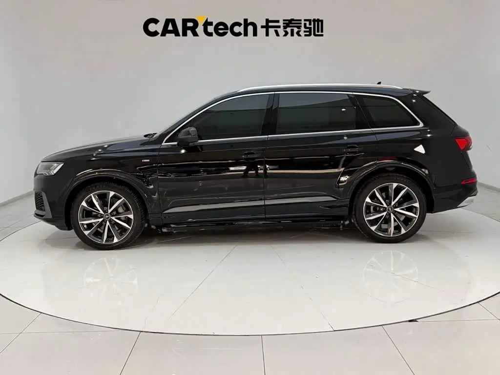 Audi Q7 2021 — Фото 6/20