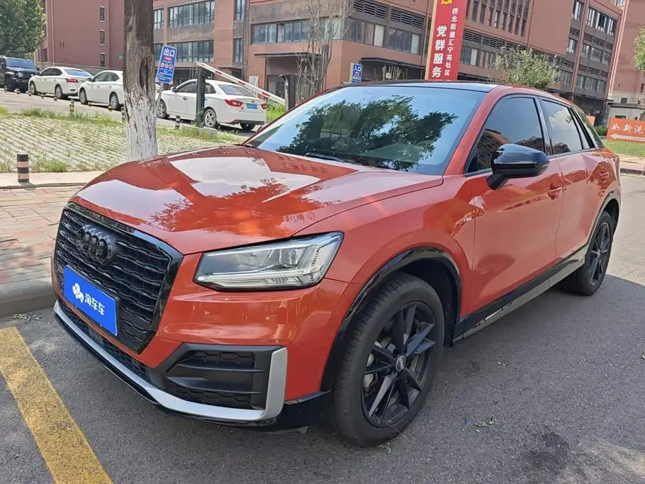 Audi Q2L 2021 — Photo 1/16