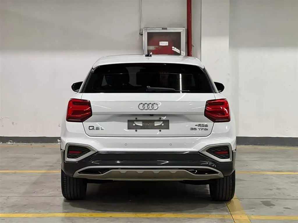Audi Q2L 2022 — Фото 6/20