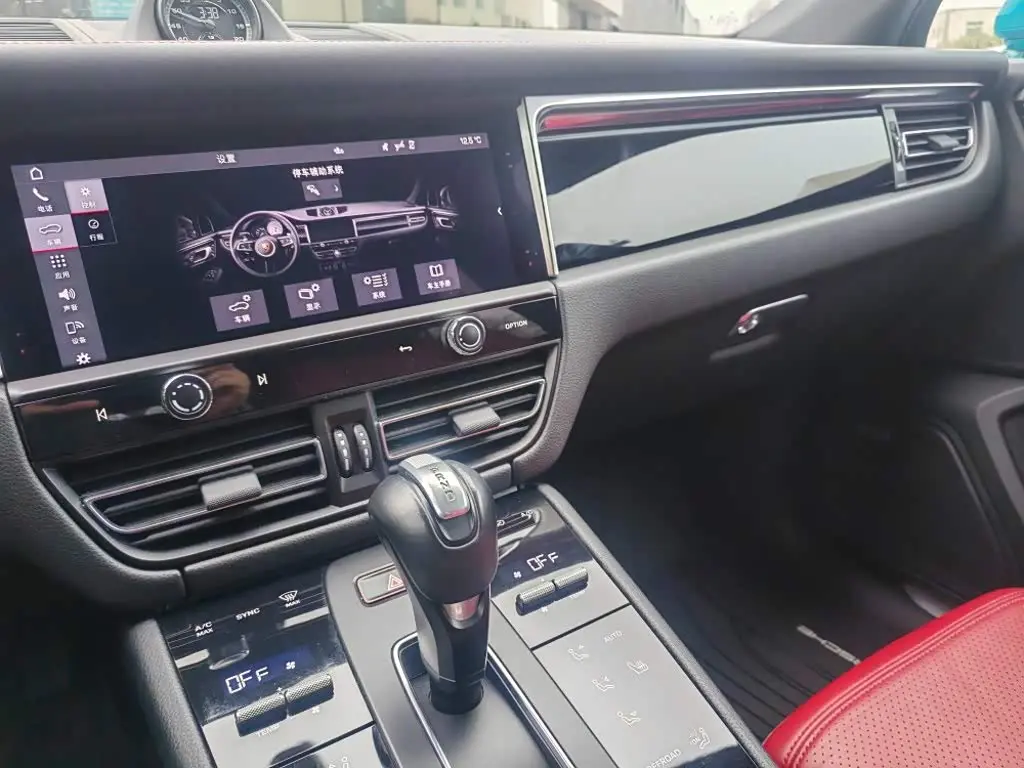 Porsche Macan 2023 — Фото 15/16