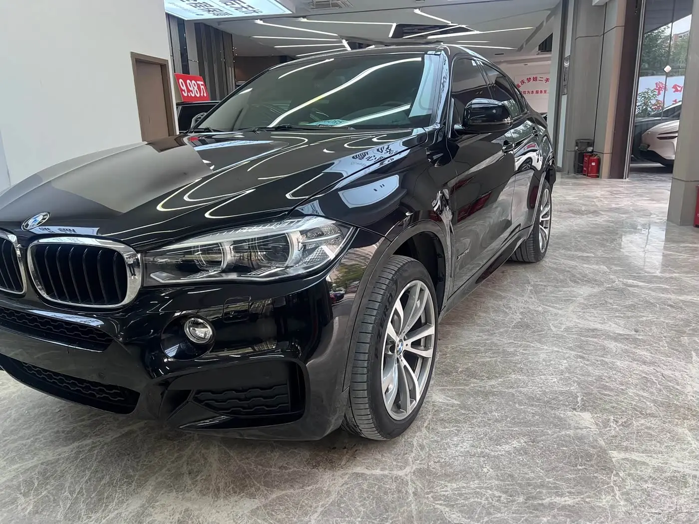 BMW X6 2019 — Photo 2/12