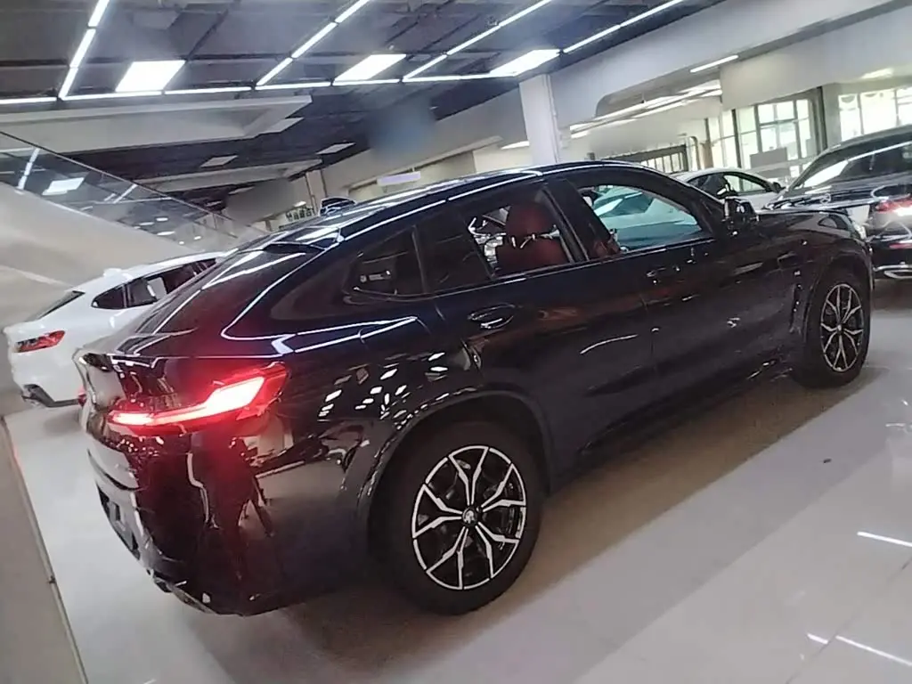 BMW X4 2024 — Фото 7/20