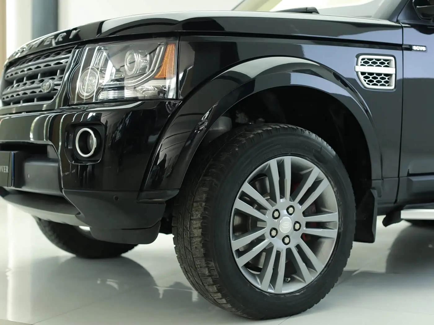 Land Rover Discovery 2014 — Фото 2/16