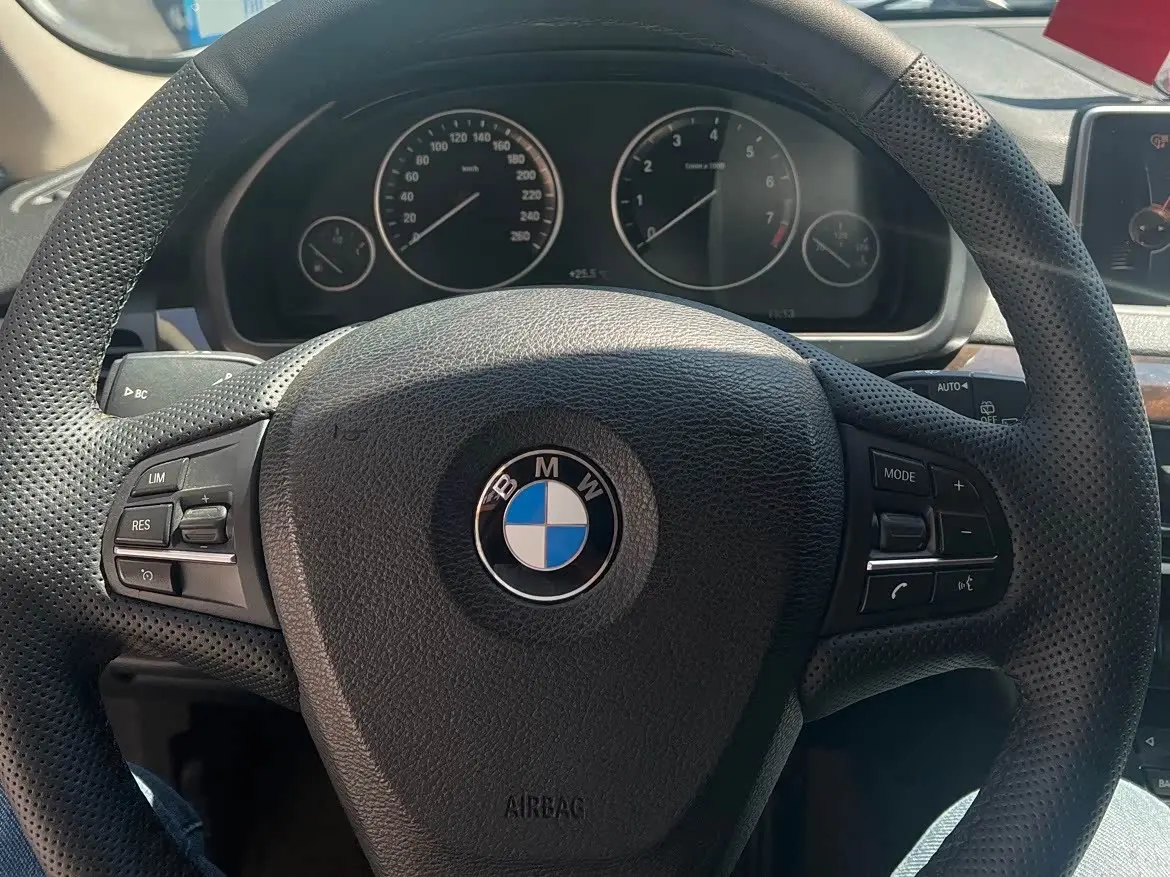 BMW X5 2015 — Фото 12/13