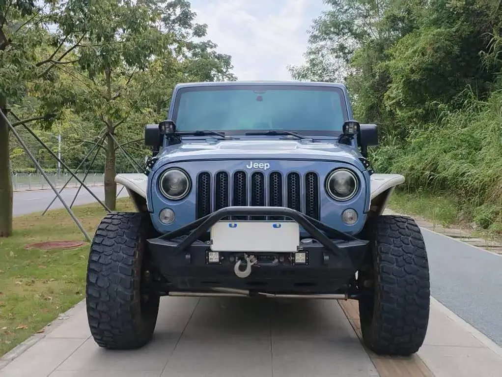 Jeep Wrangler 2014 — Фото 2/9