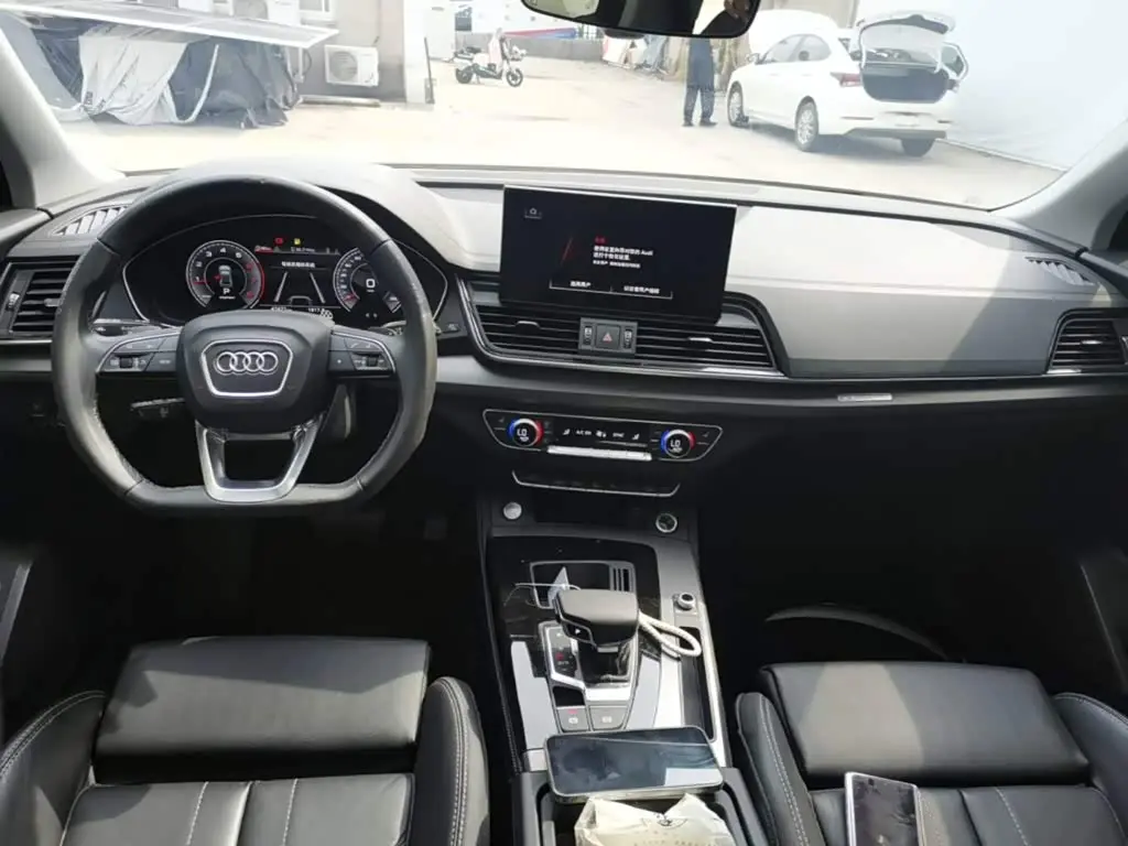 Audi Q5L 2022 — Фото 10/20