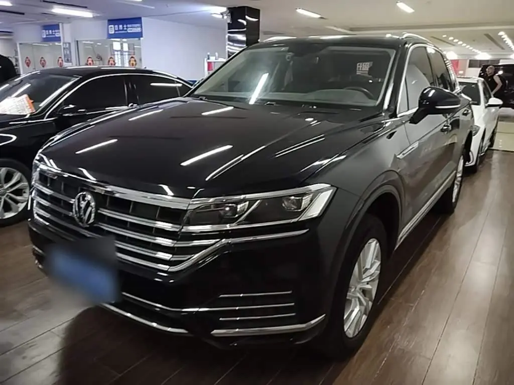Volkswagen Touareg 2019 — Фото 2/20