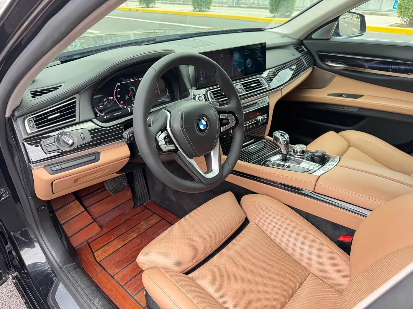 BMW 7 Series 2010 — Фото 12/20