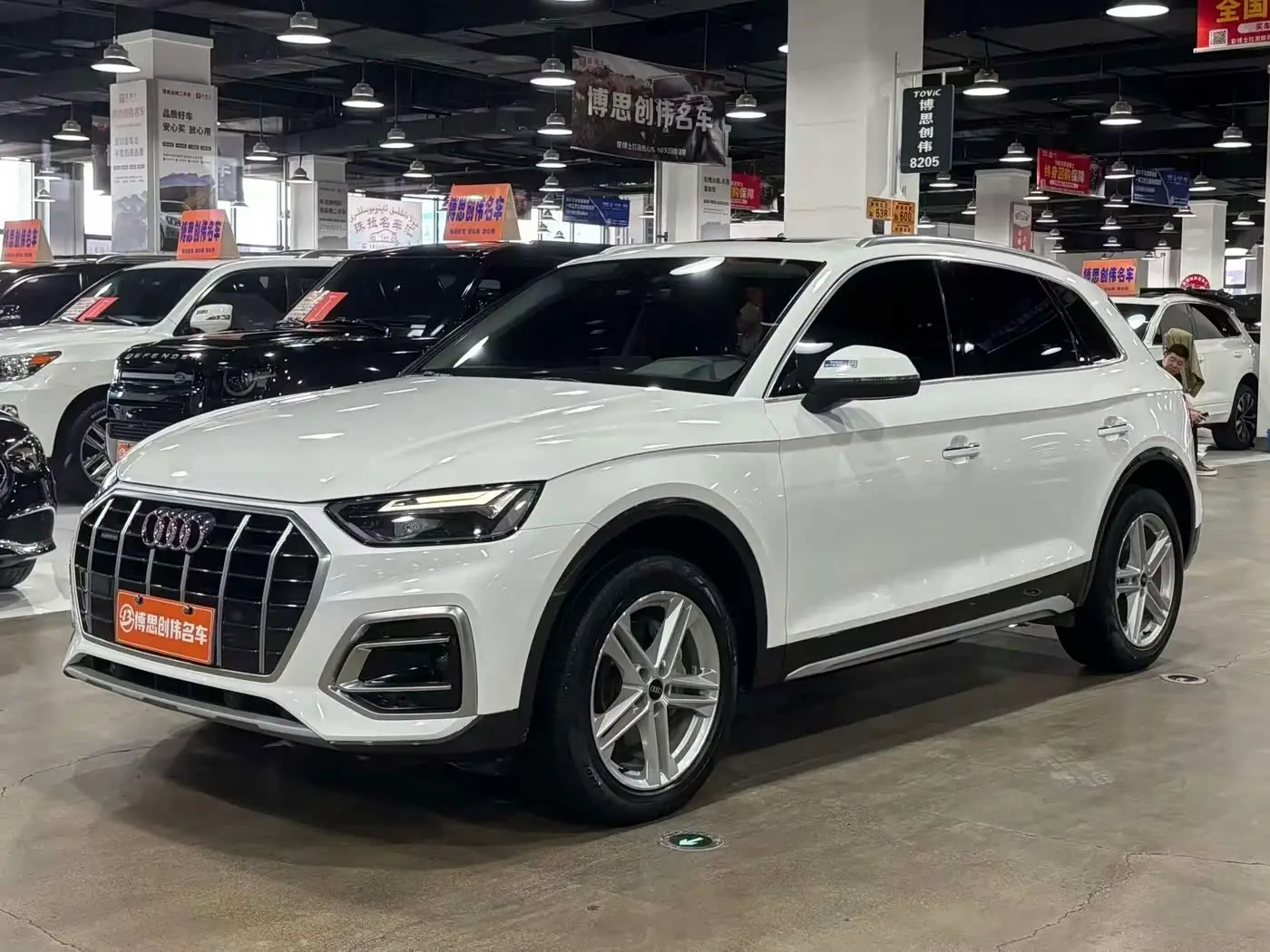 Audi Q5L 2023 — Фото 1/19