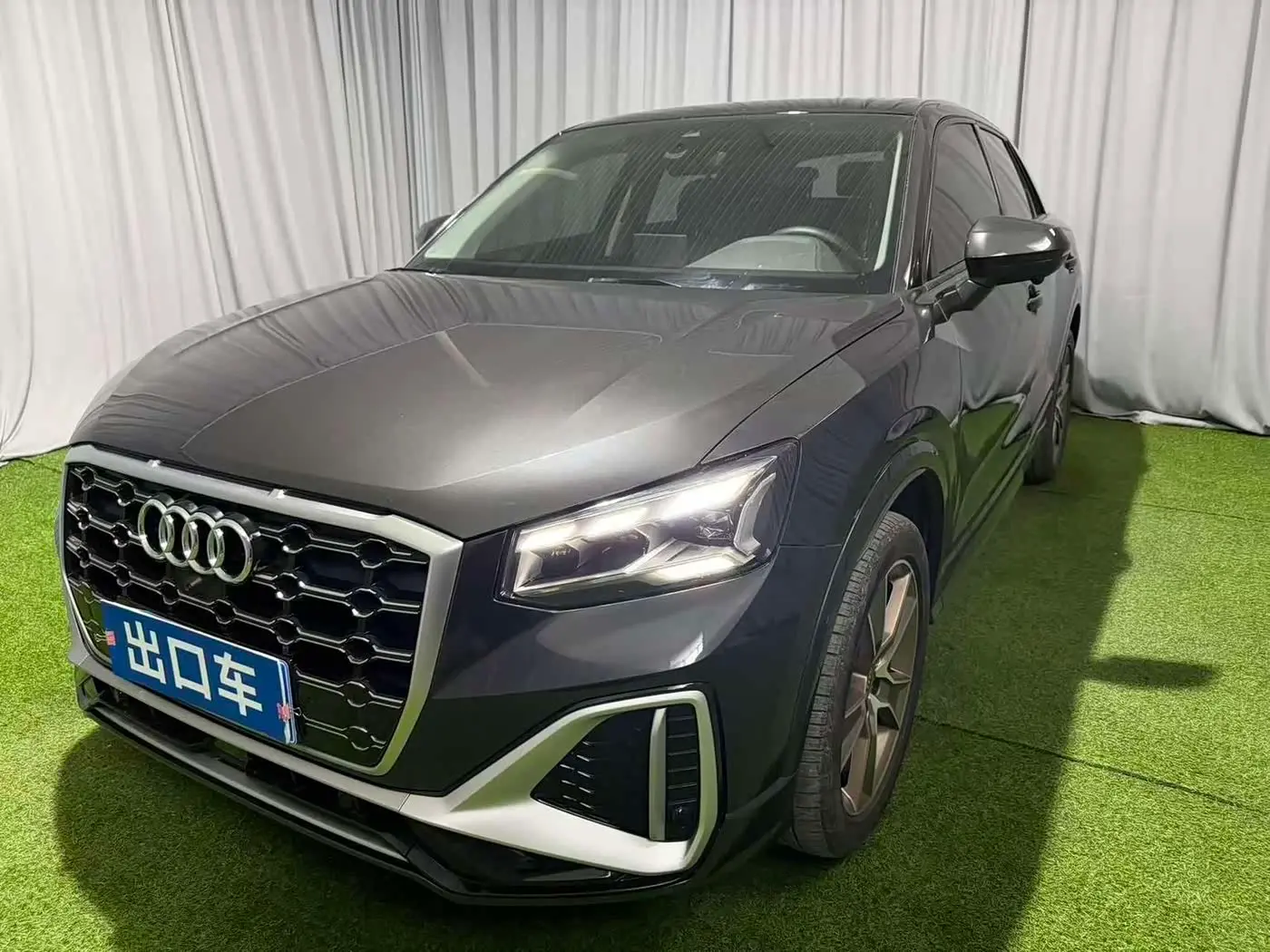 Audi Q2L 2022 — ფოტო 1/18