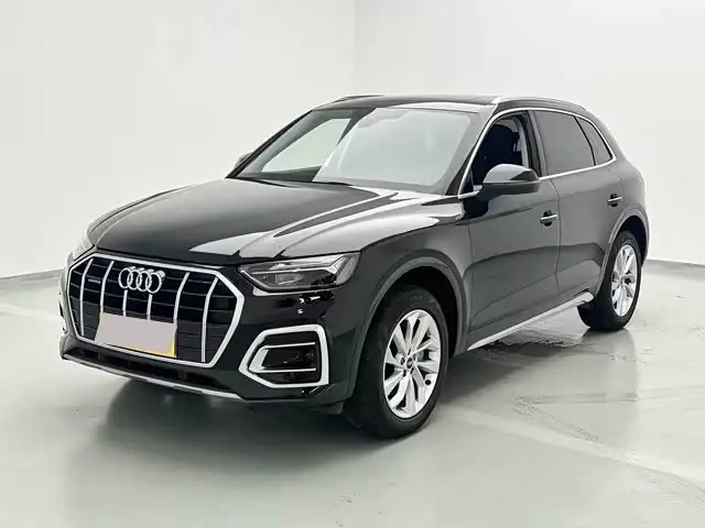 Audi Q5L 2024 — Фото 1/20