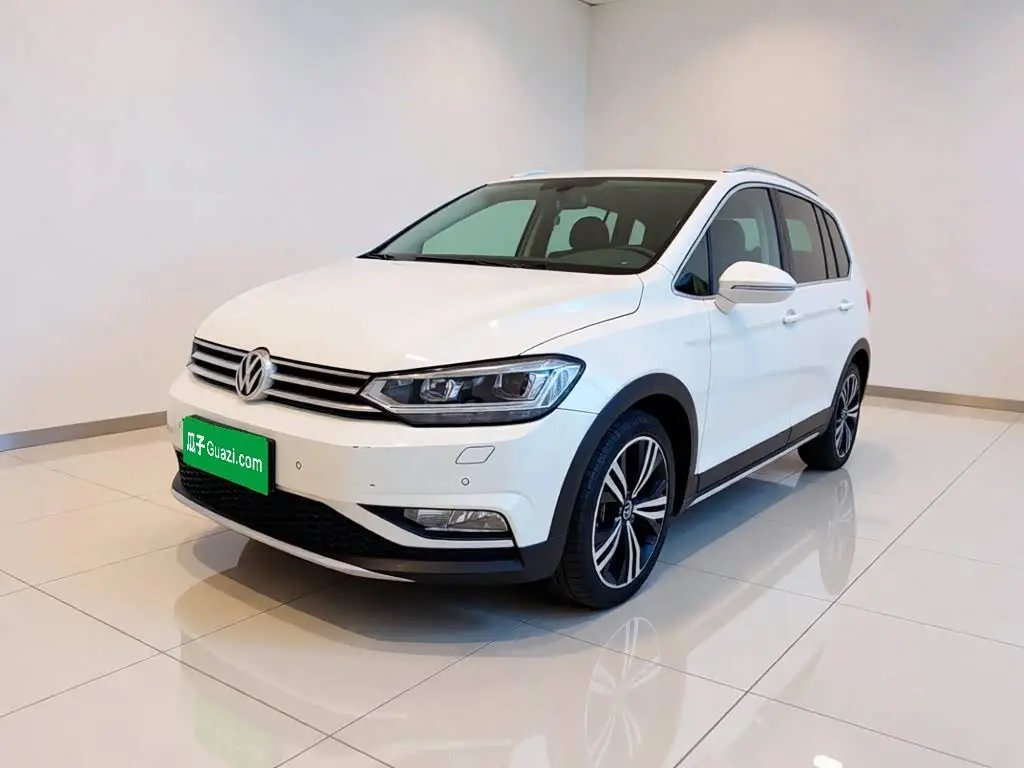 Volkswagen Touran 2021 — Фото 1/20