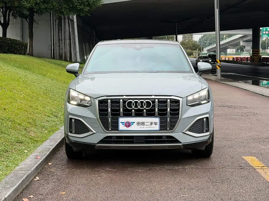 Audi Q2L 2022 — Фото 2/14