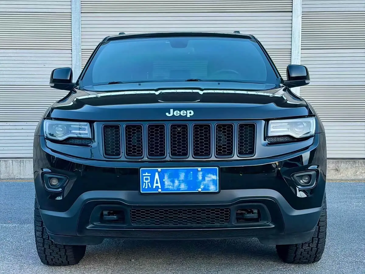 Jeep Grand Cherokee 2014 — Фото 2/9