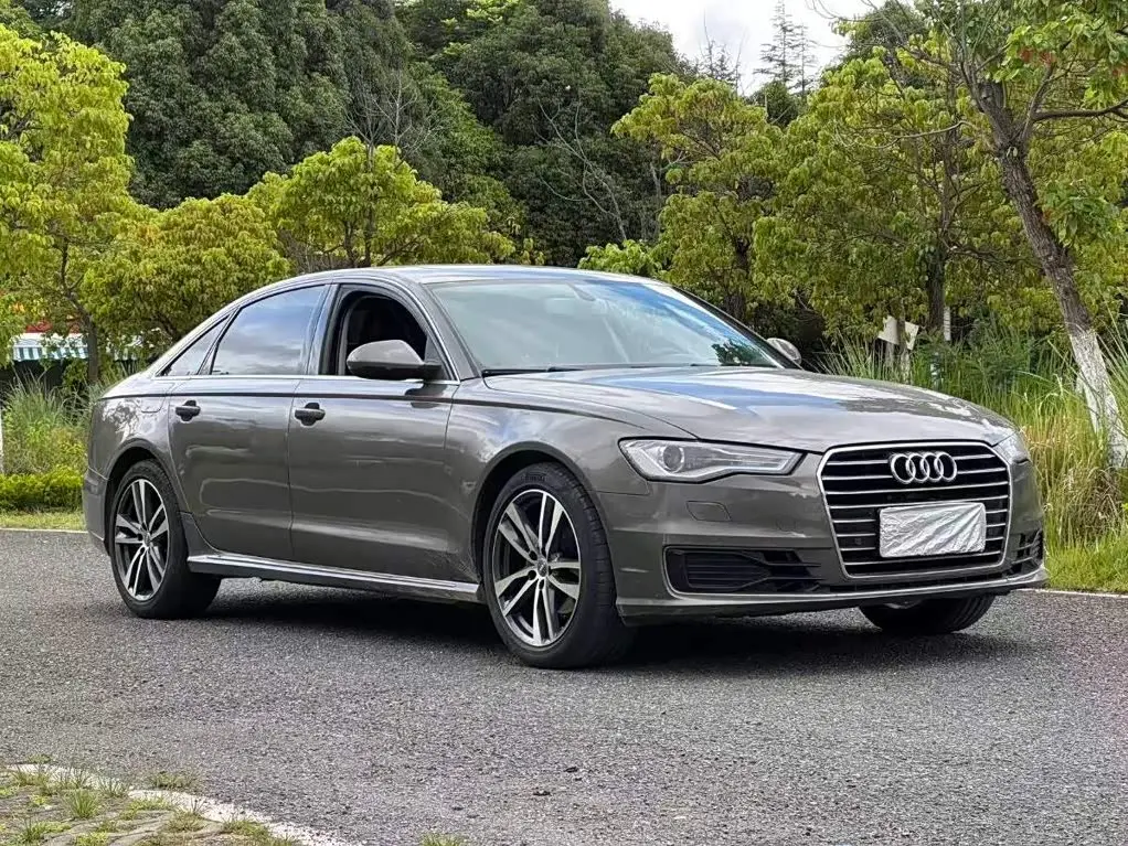 Audi A6L 2016 — Фото 1/9