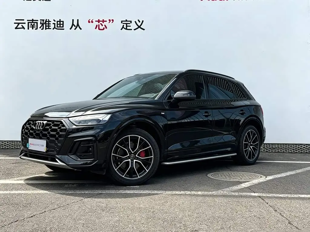 Audi Q5L 2024 — Photo 1/20